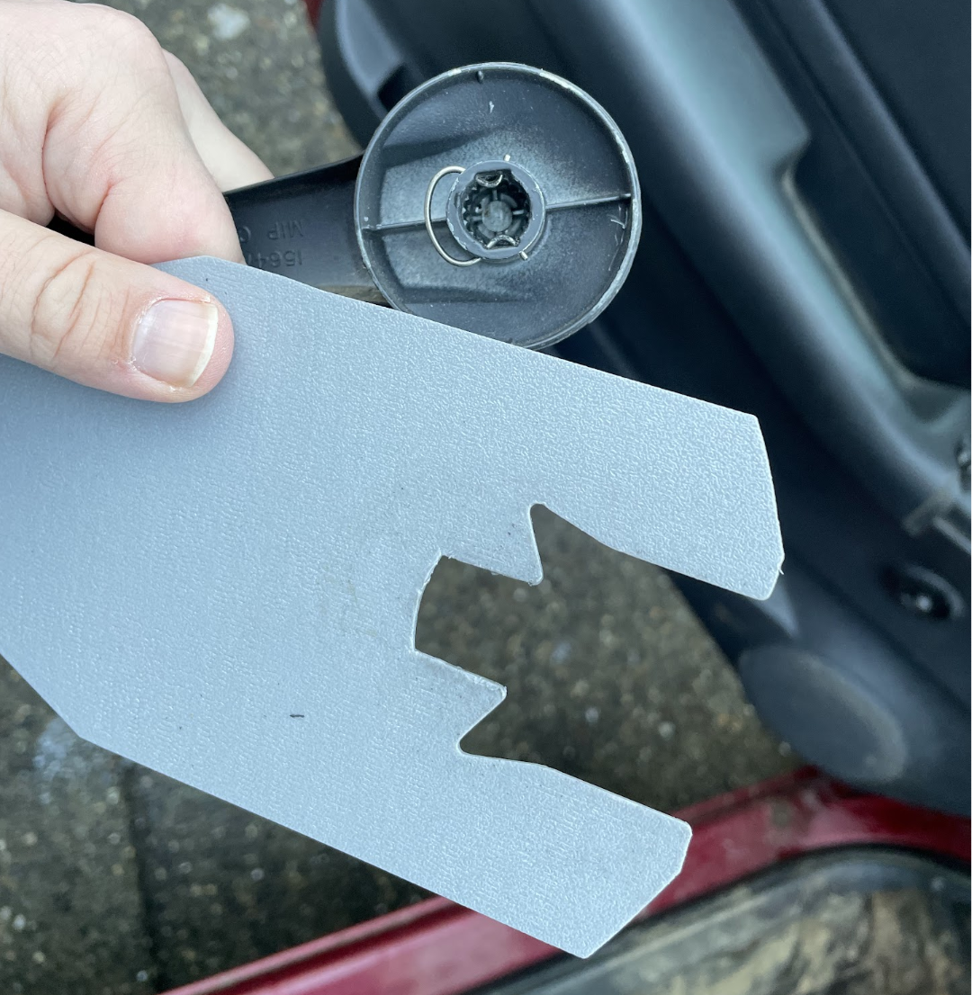 Manual window crank spring removal tool