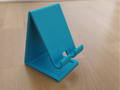 phone holder with charging cable hole