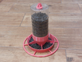 Bird feeder made from a granulated tea bottle