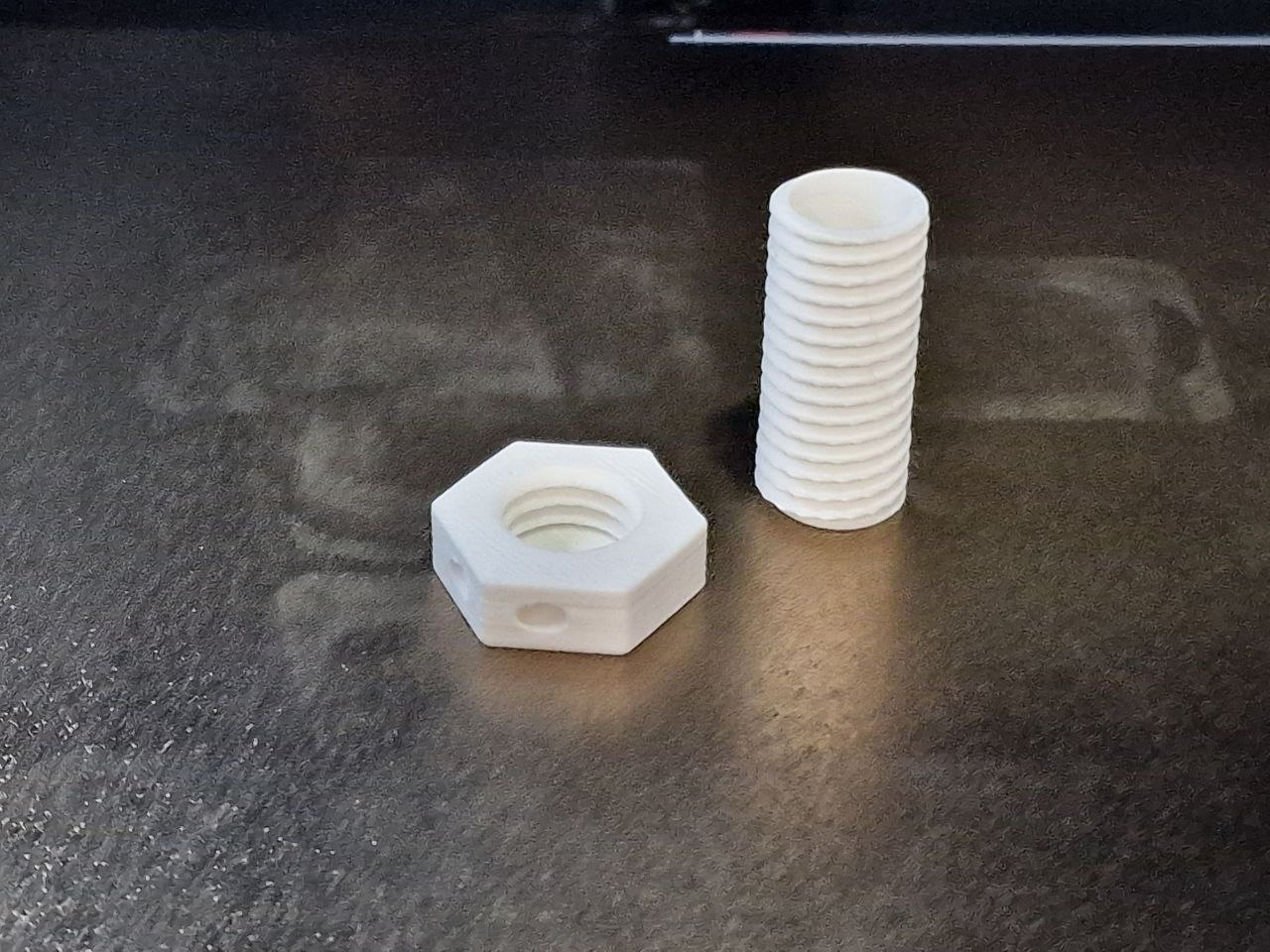 Bolt keychain with secret chamber