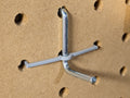 Pegboard hook clip