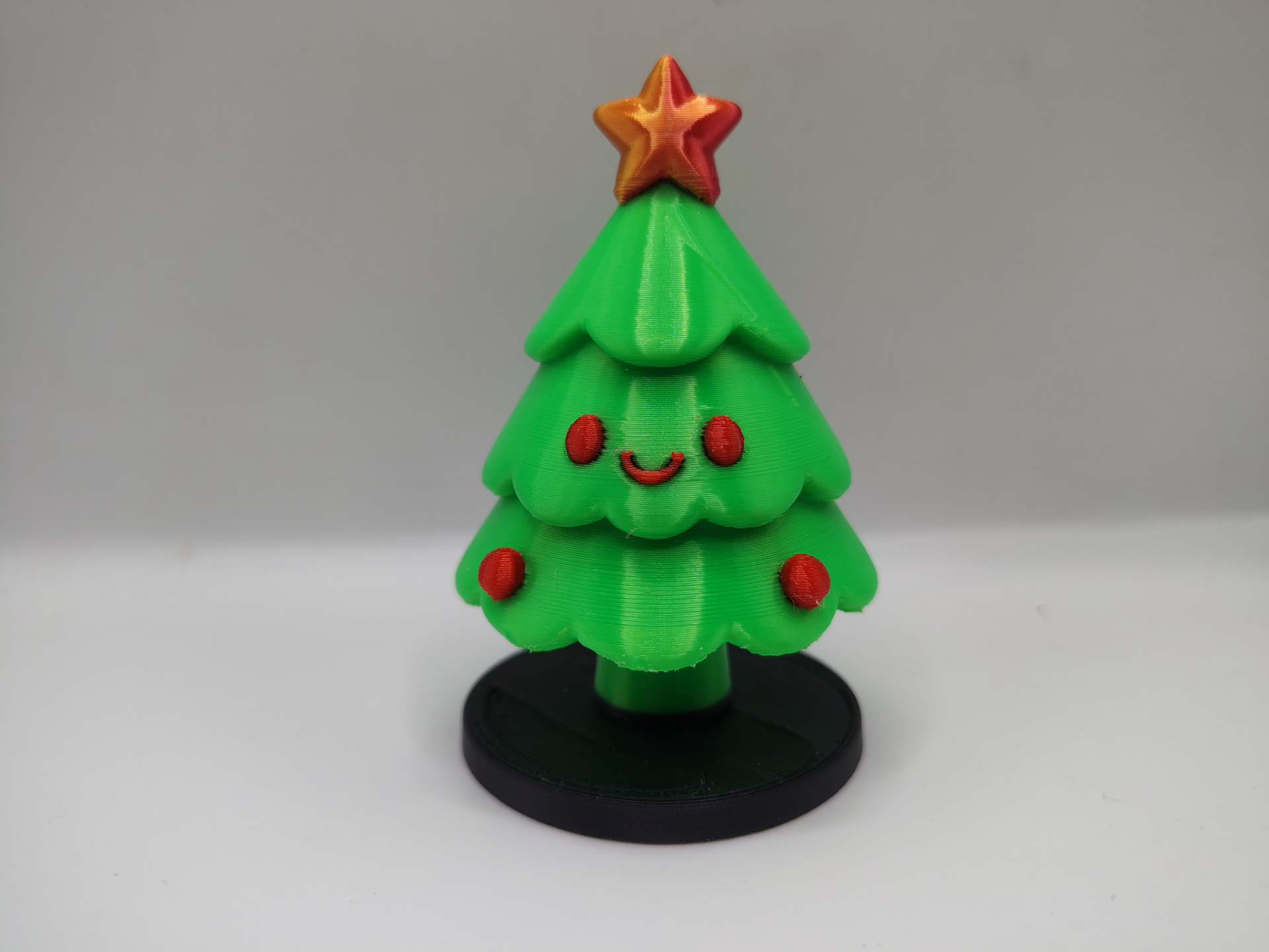 Smiling Christmas Tree with Star Topper