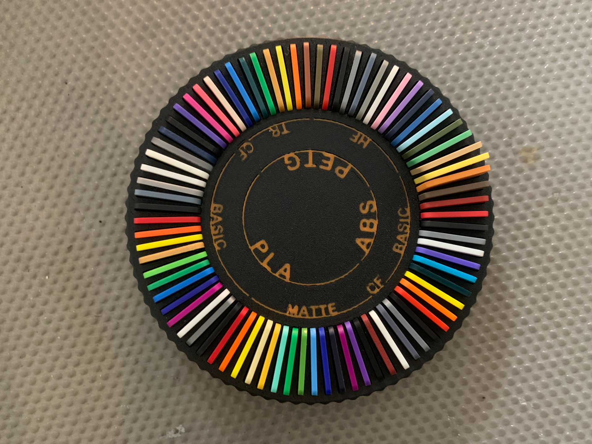 NEW SWATCHES Spinning filament display with names