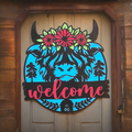 Daisy the Highland cow Welcome sign