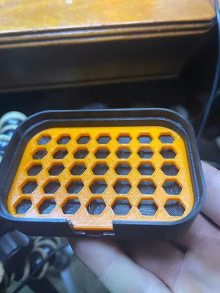 Soap holder with drain