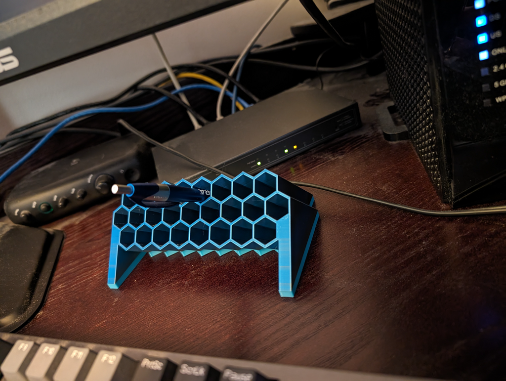 Angled hexagonal multicolor pen holder
