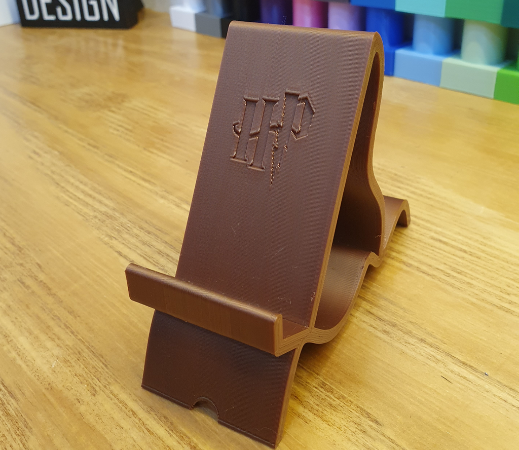 phone stand with Harry Potter logo