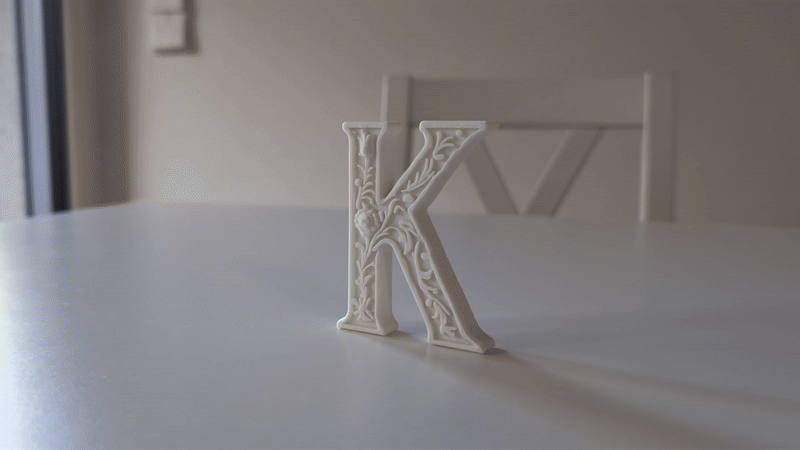 Standing Letter K in a Gypsum Floral Style