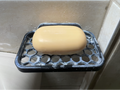 Soap holder with wall mounting hole