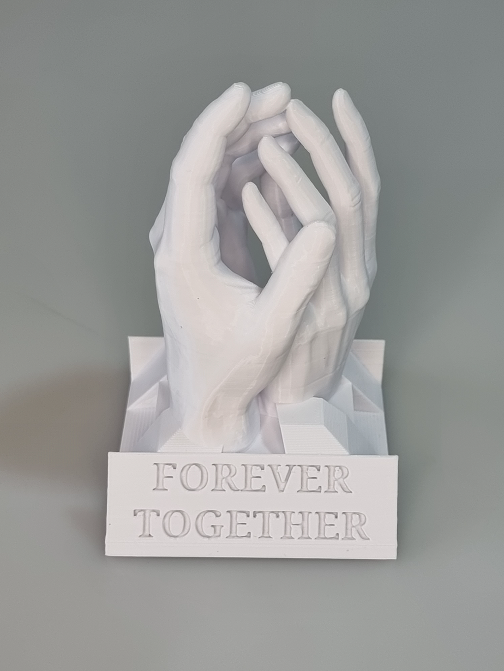 Holding hands with message