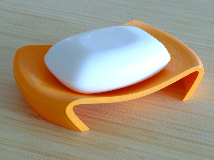 Curved soap holder