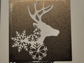 reindeer silhouette with christmas stars wall art