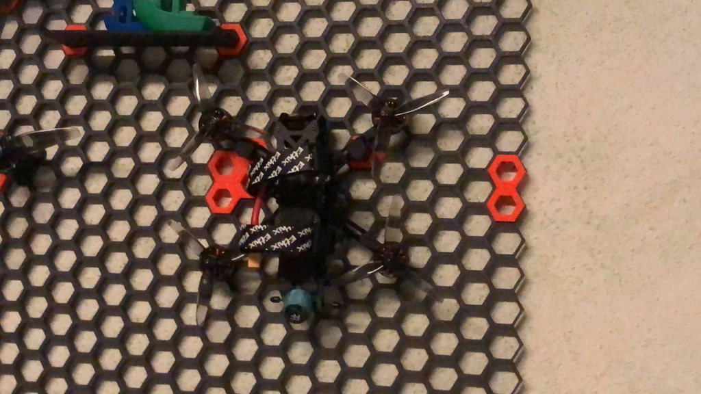 Hook with 30° angle (for hanging up drones in my case) - Honeycomb storage wall