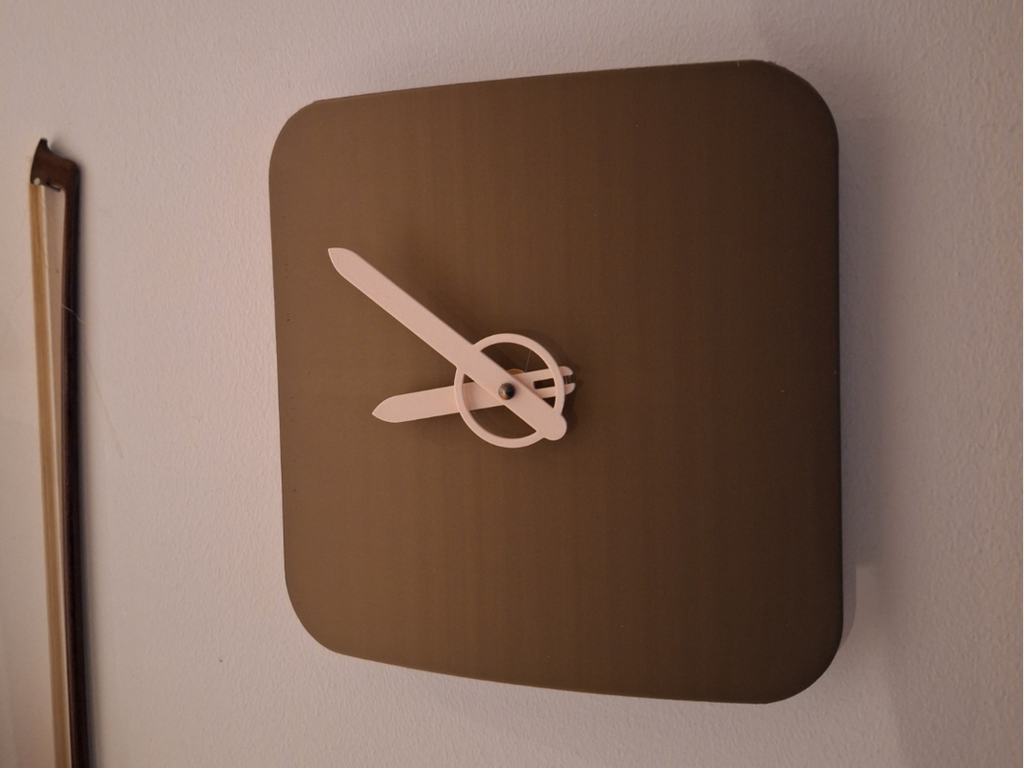 Curved analog wall clock