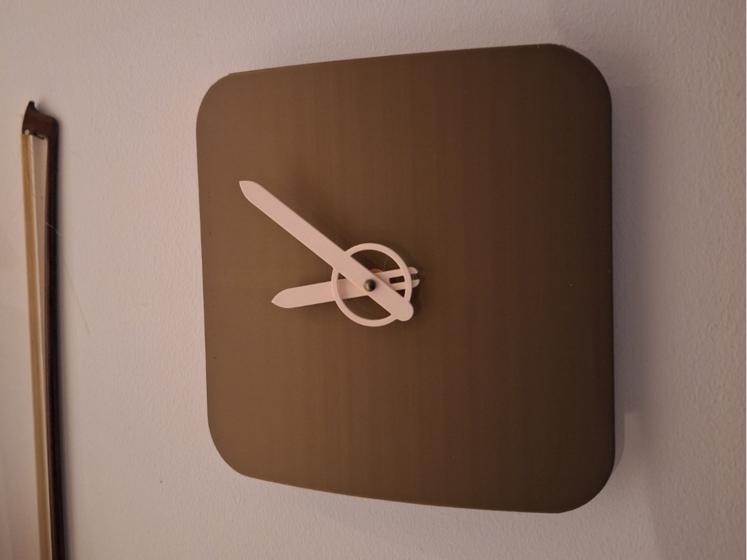 Curved analog wall clock