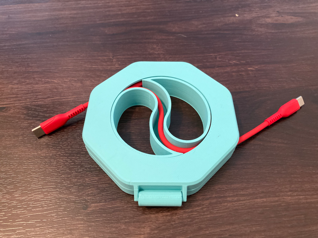 Cable winder with parametric CAD. Print in place cable organizer, wire spool for pegboard