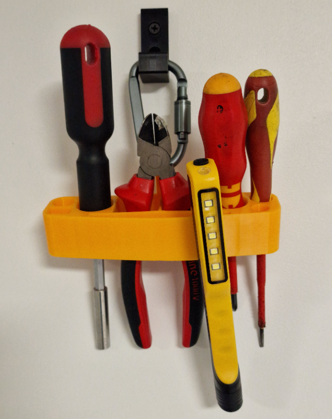 Tool holder/holster for belt buckle