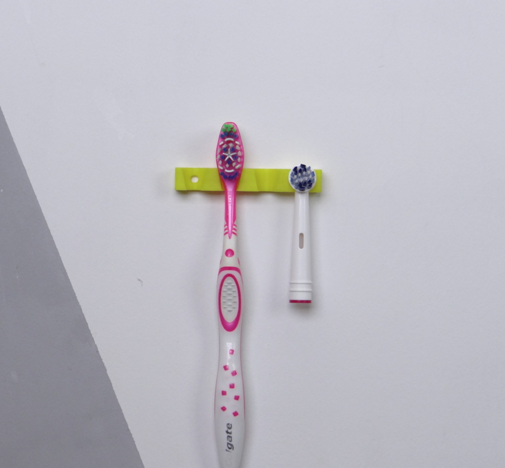 Simple wall tootbrush holder