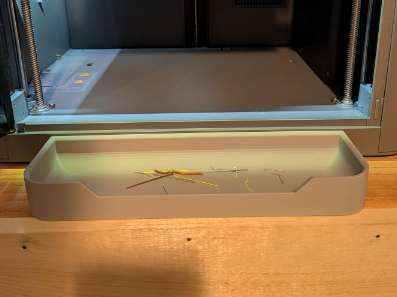 Front purge-line bin