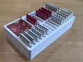 Sewing machine needle box