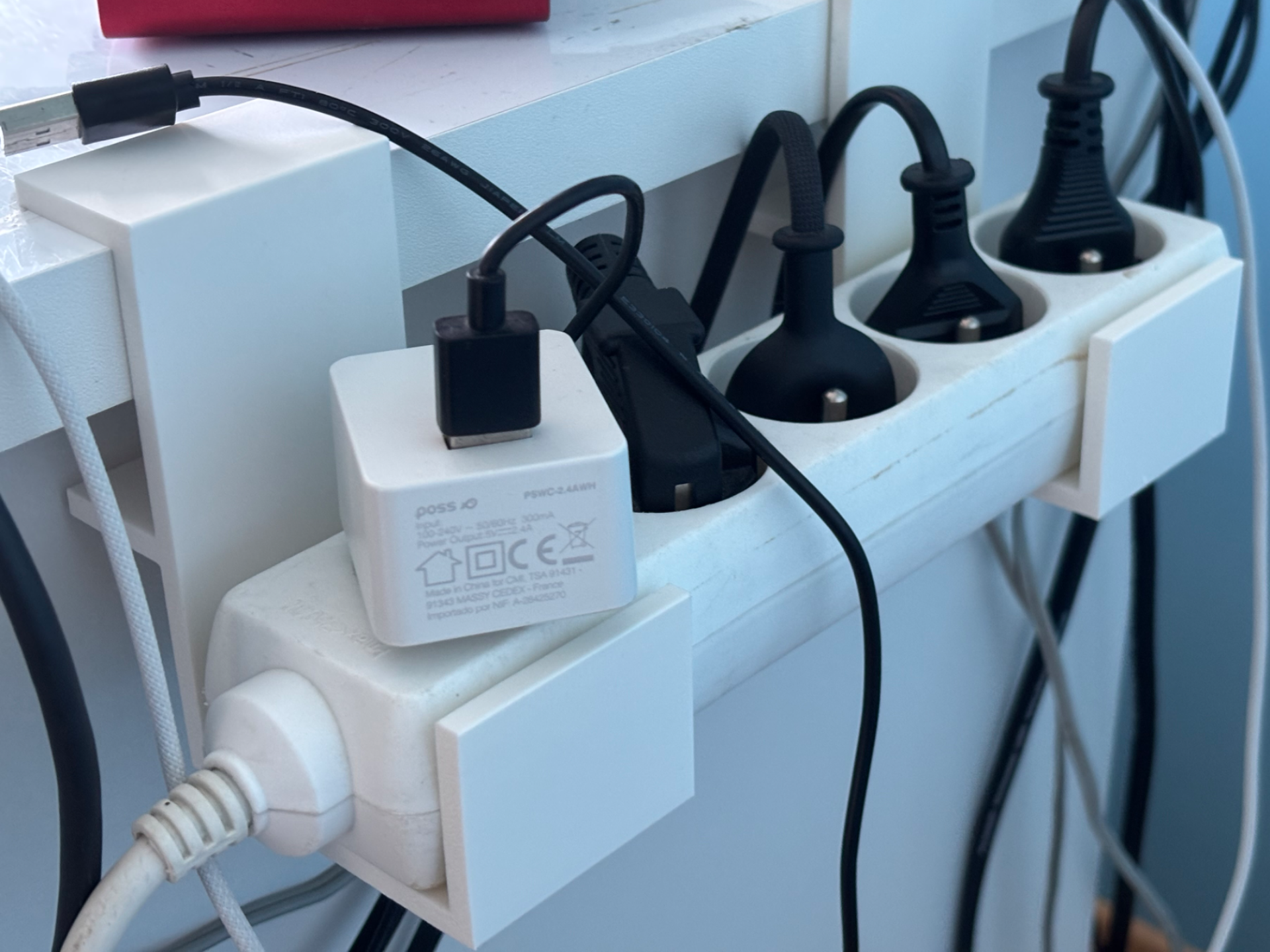 Power strip holder under desk