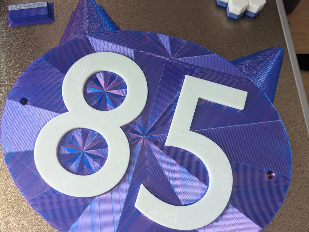 House Sign for number 85 on a cat