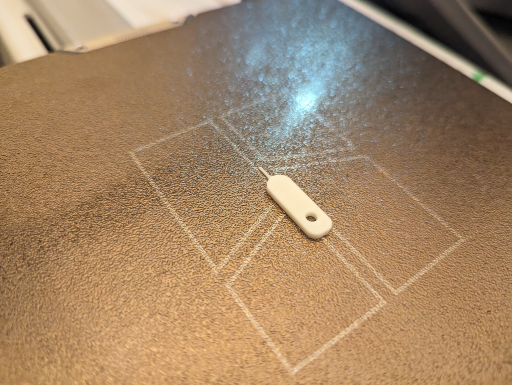 Sim Tray Ejector