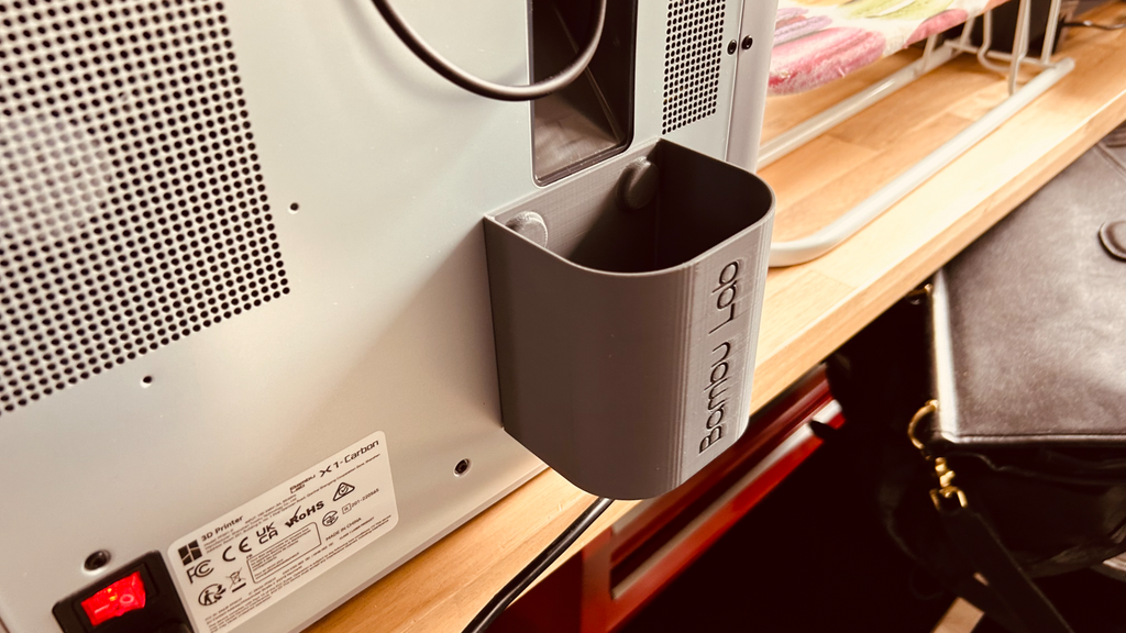 Filament catch can with 4 magnets (12x3, round) for X1C, P1P and P1S. Simple but effective.