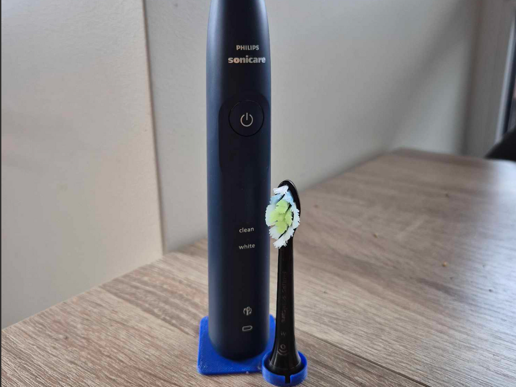Philips SoniCare toothbrush and it's head stand
