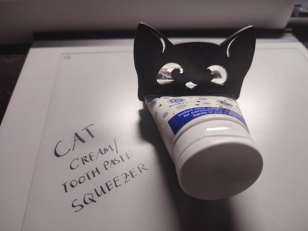 Cat design cream or toothpaste squeezer