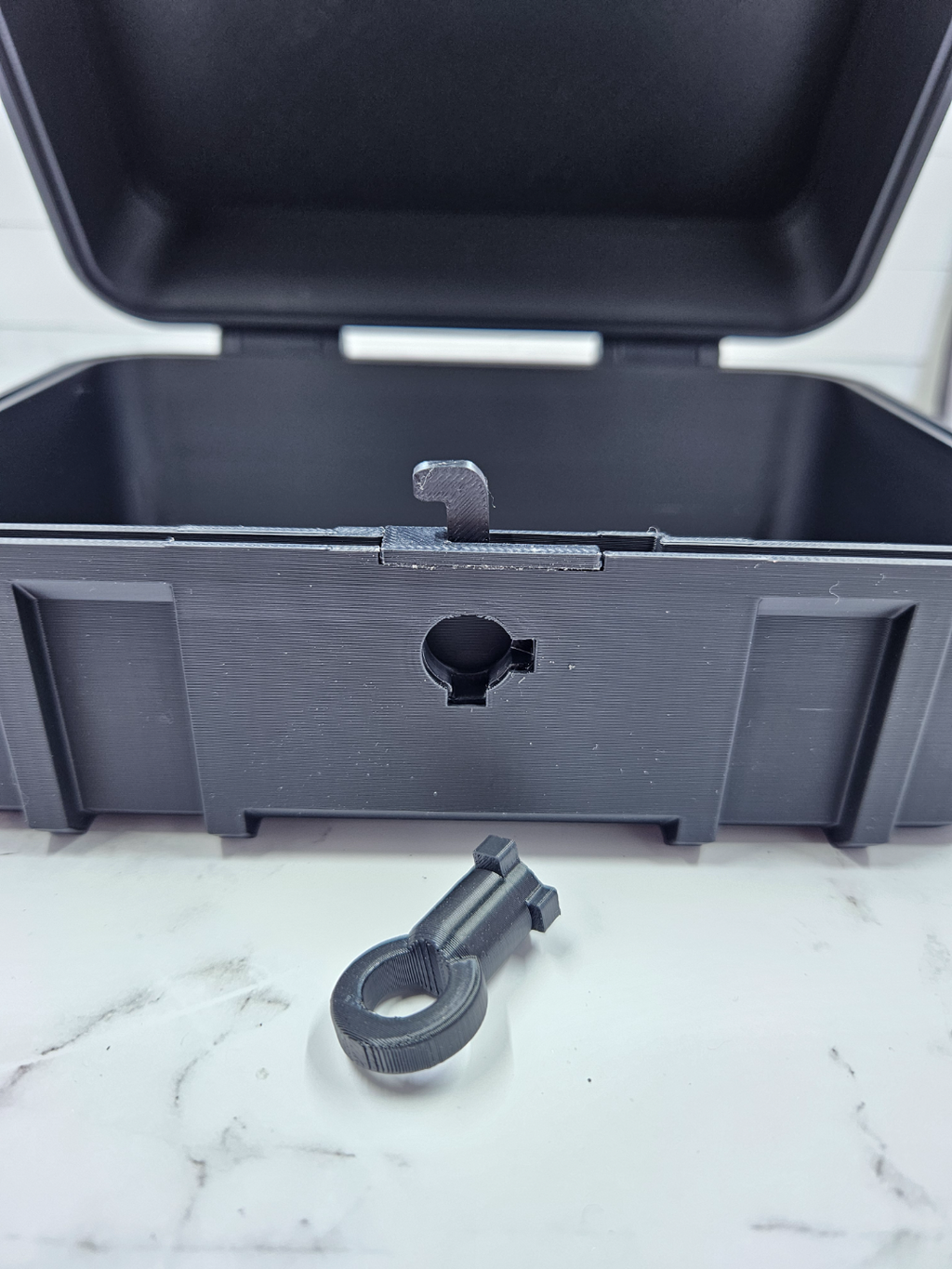 Rugged box with tumbler style key and lock