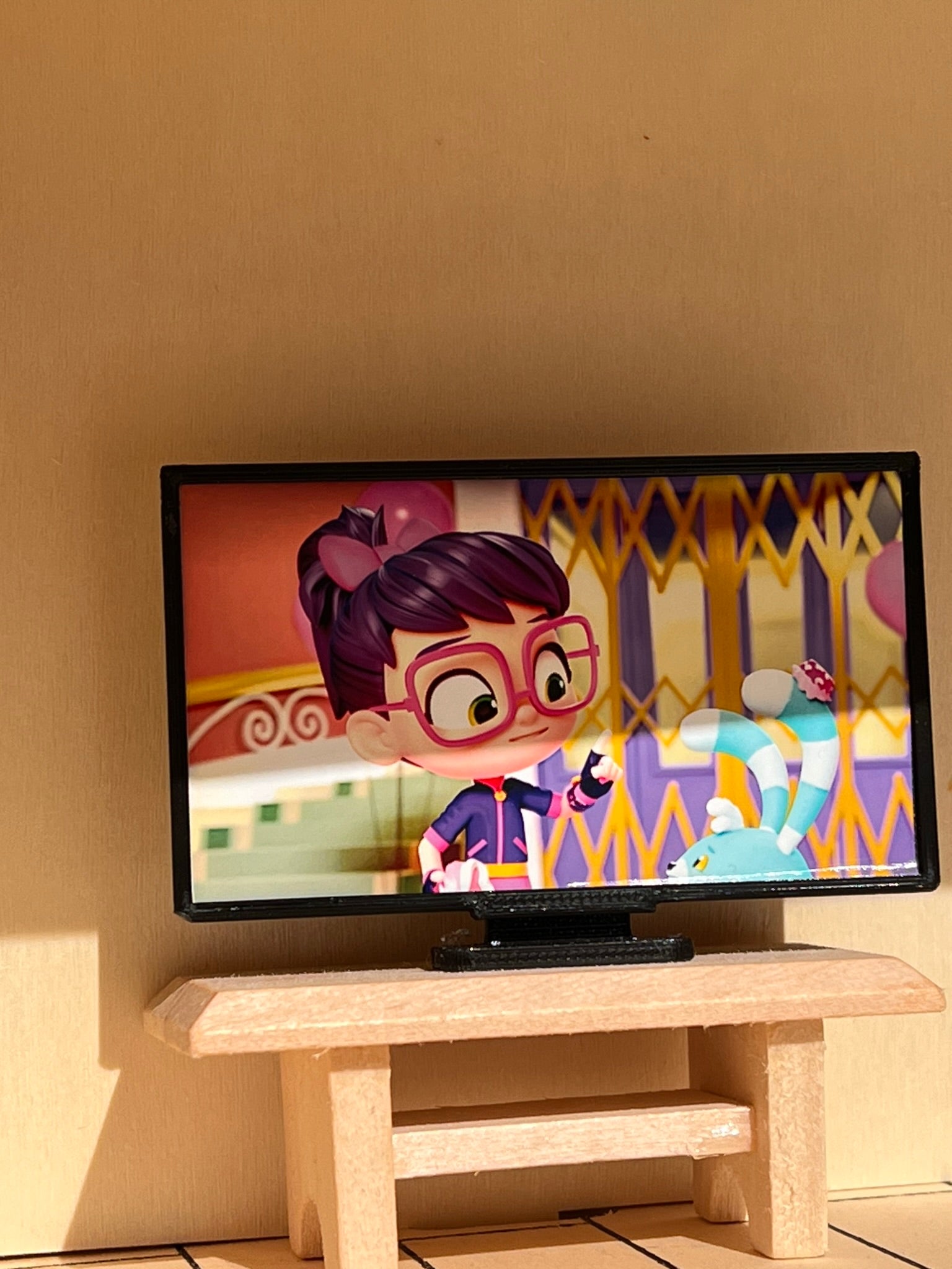 Miniaturized TV for dollhouses