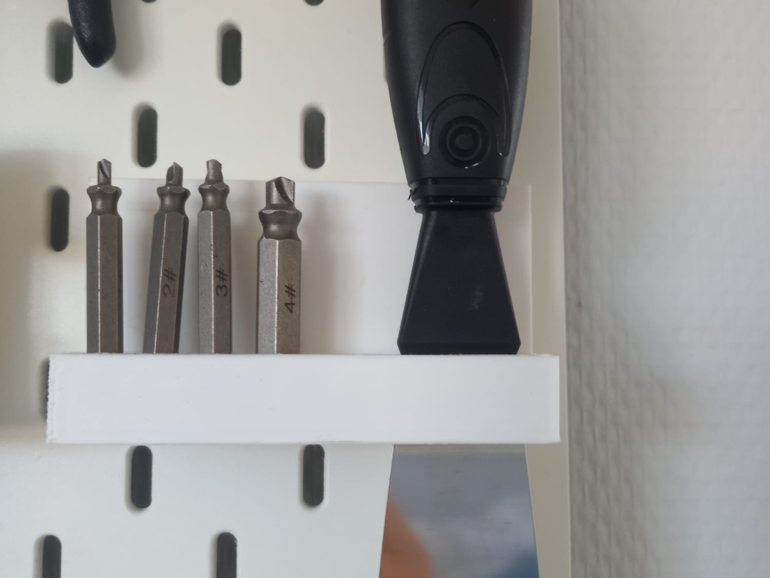 scraper and bit holder pegboard
