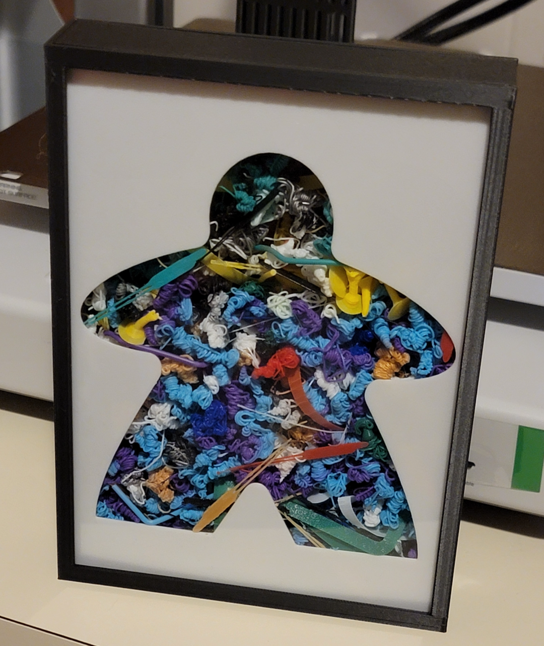 Meeple Faceplate for Filament Purge Shadow Box