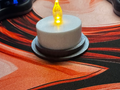 Tea light adapter for middle finger ghost