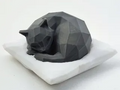 Cute low poly sleeping cat on pillow