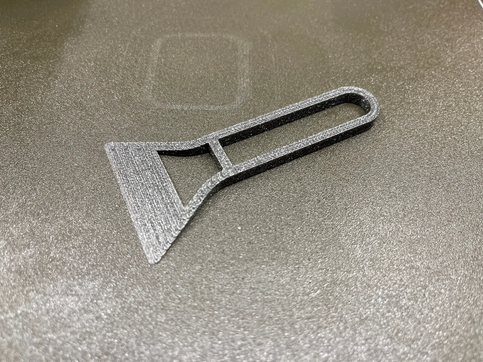 Print plate bed scraper