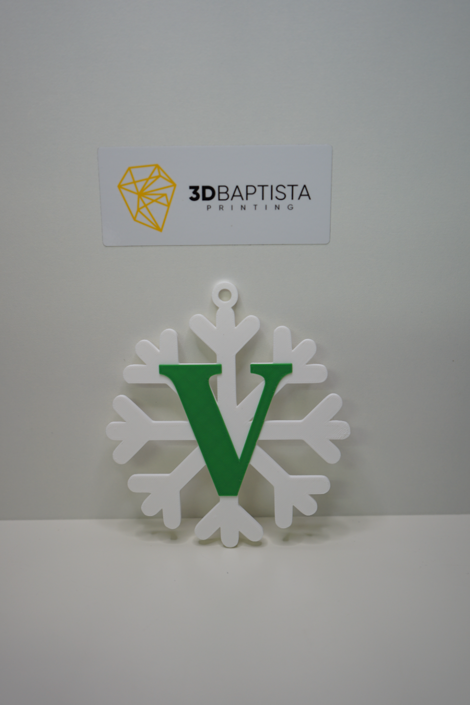 snowflake with letter V