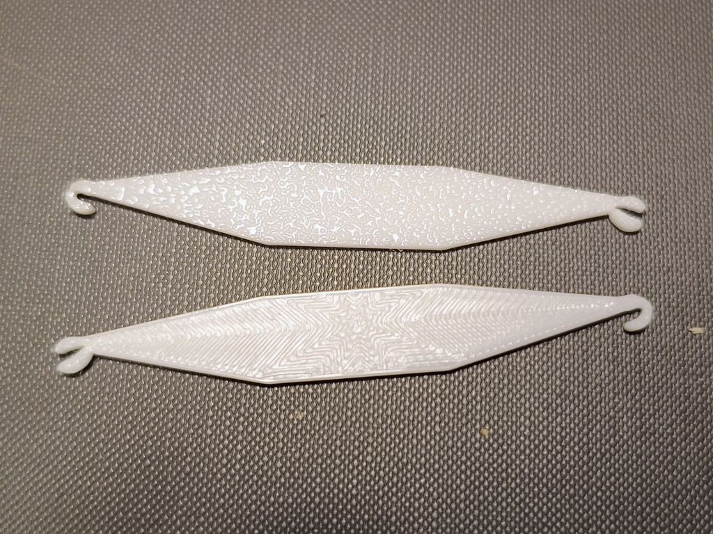 Hook for applying elastic bands