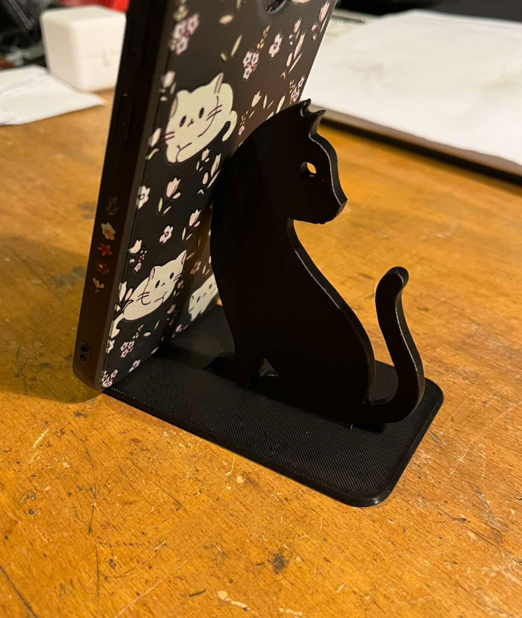 Phone, Mobile phone stand with cat motif