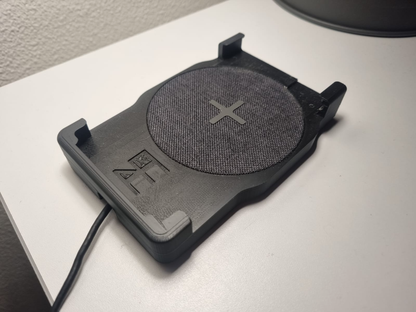 Phone holder with wireless charger inside