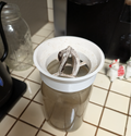 Keurig coffee extractor with built in lid