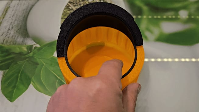 Container with opera style lid