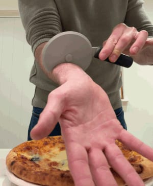 Pizza Cutter In Arm Illusion/Prank!