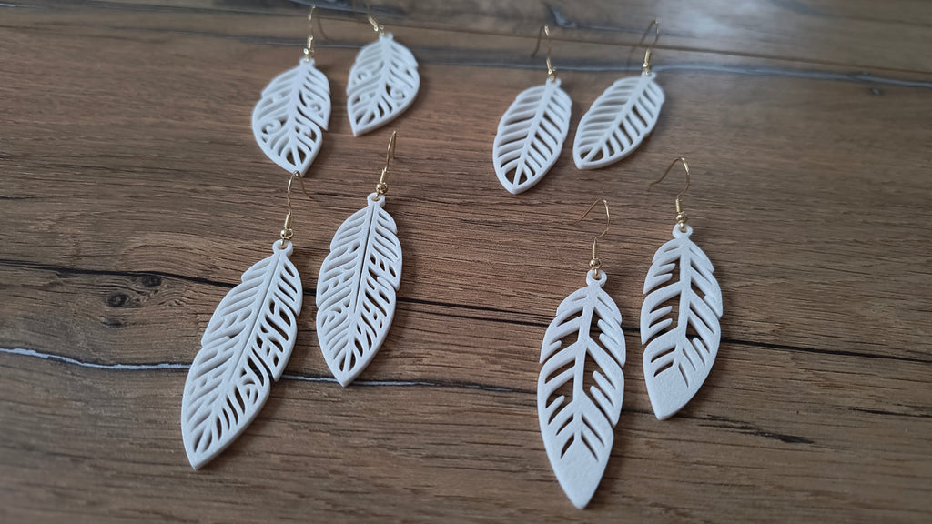 4 different elegant feather earring (free to sell)