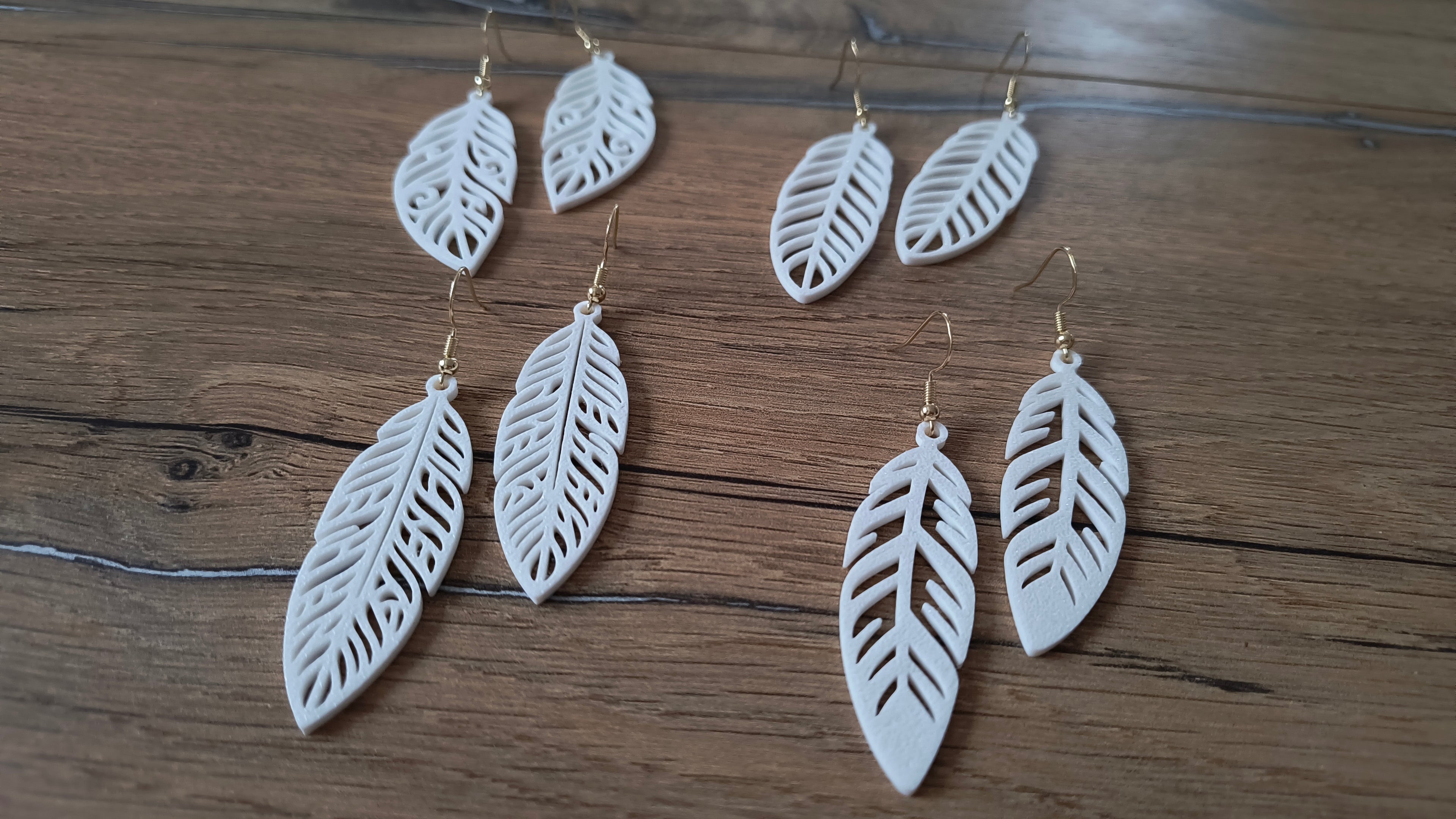 4 different elegant feather earring (free to sell)