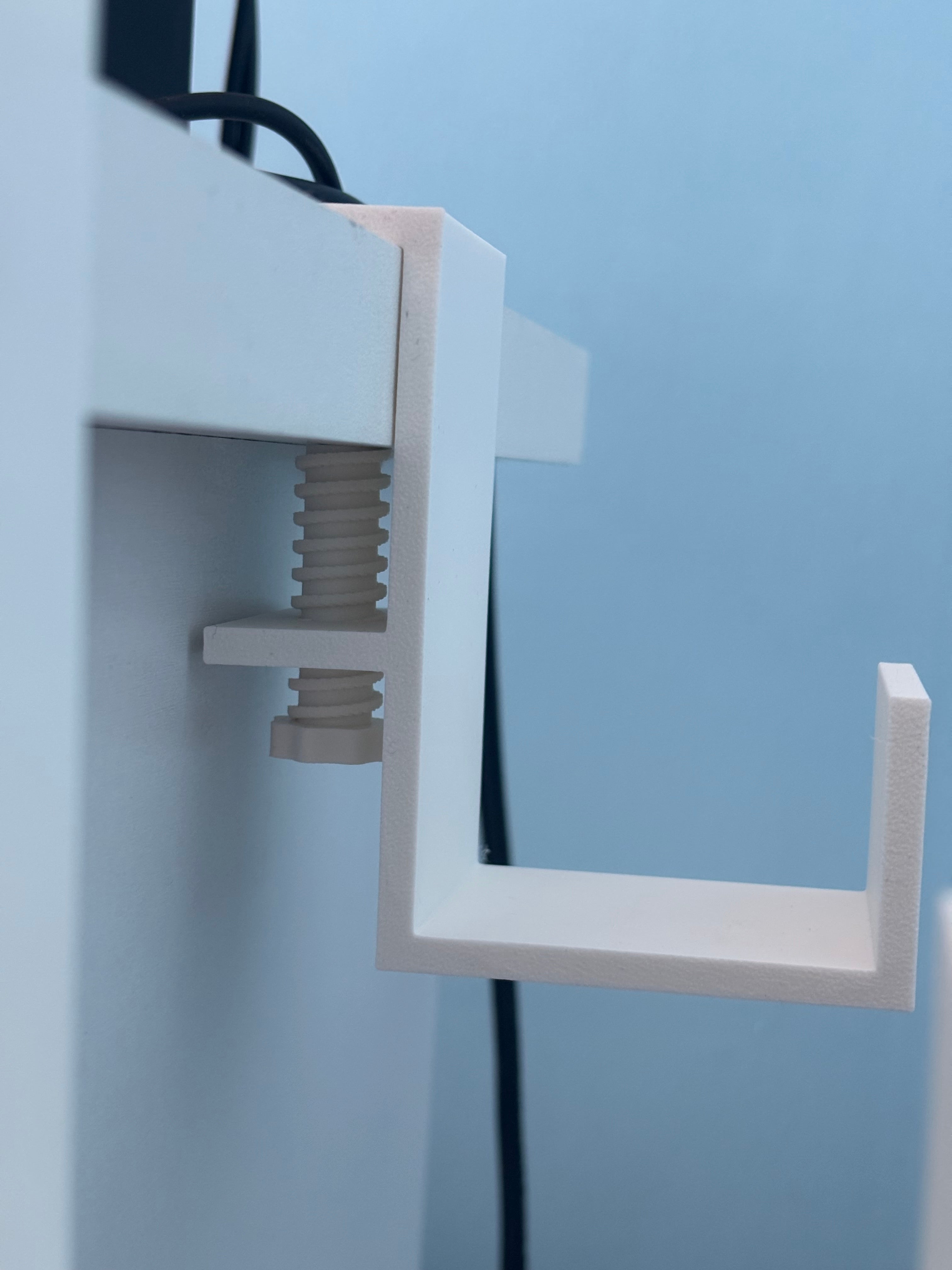 Power strip holder under desk