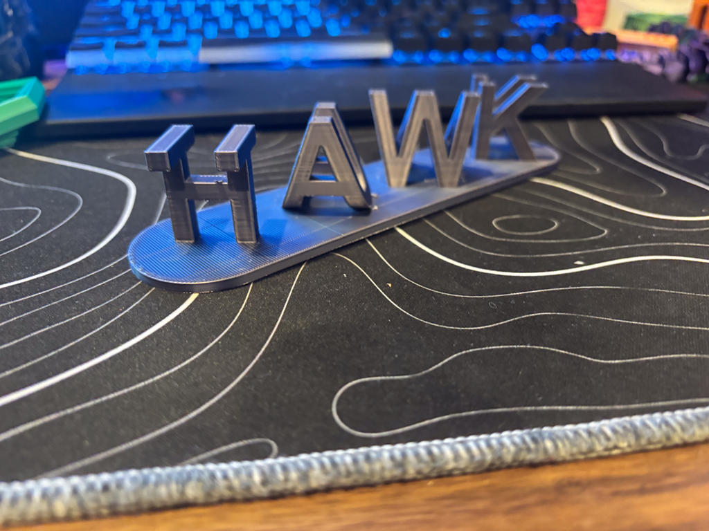 hawk Tuah flip sign