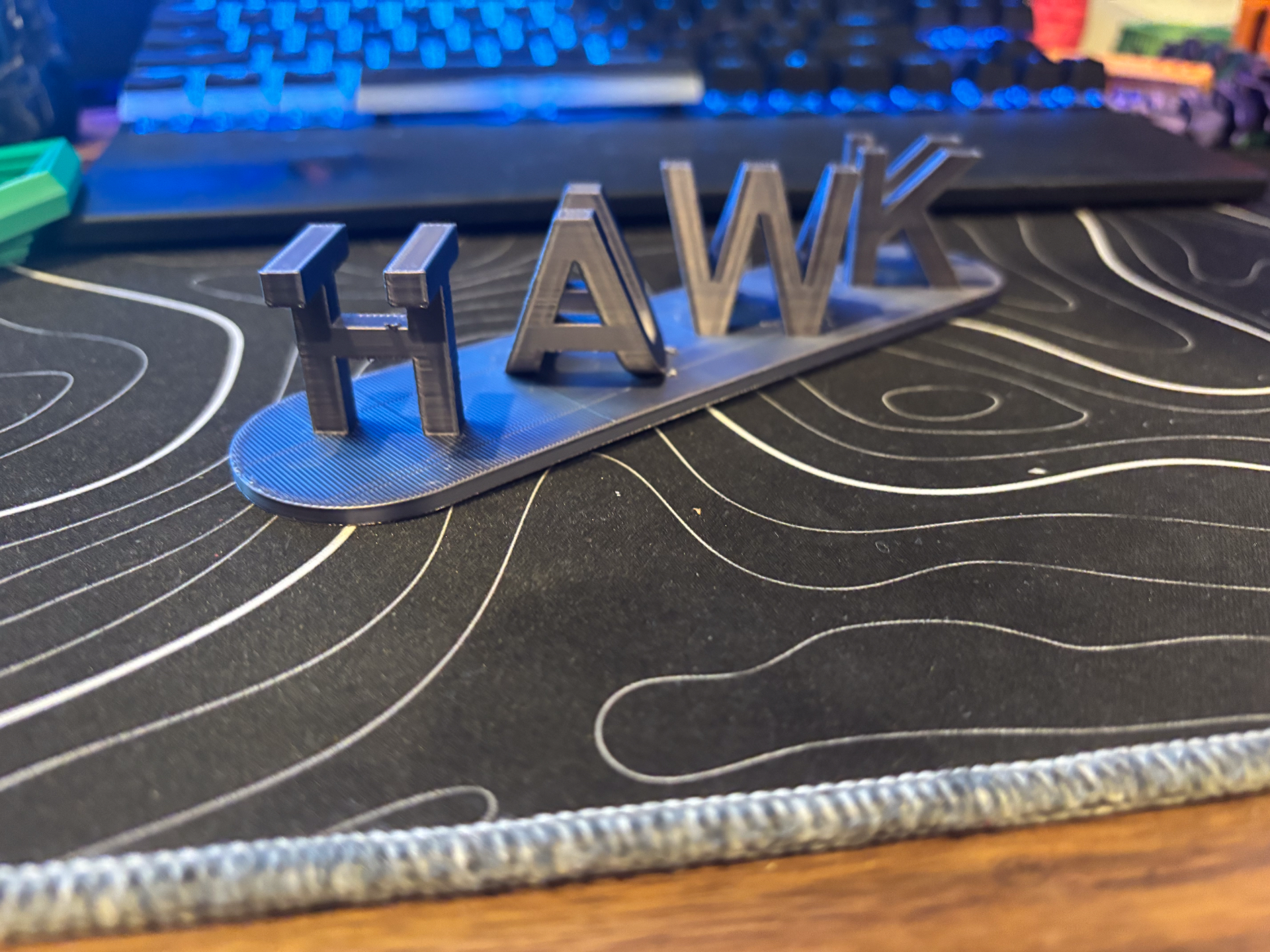 hawk Tuah flip sign