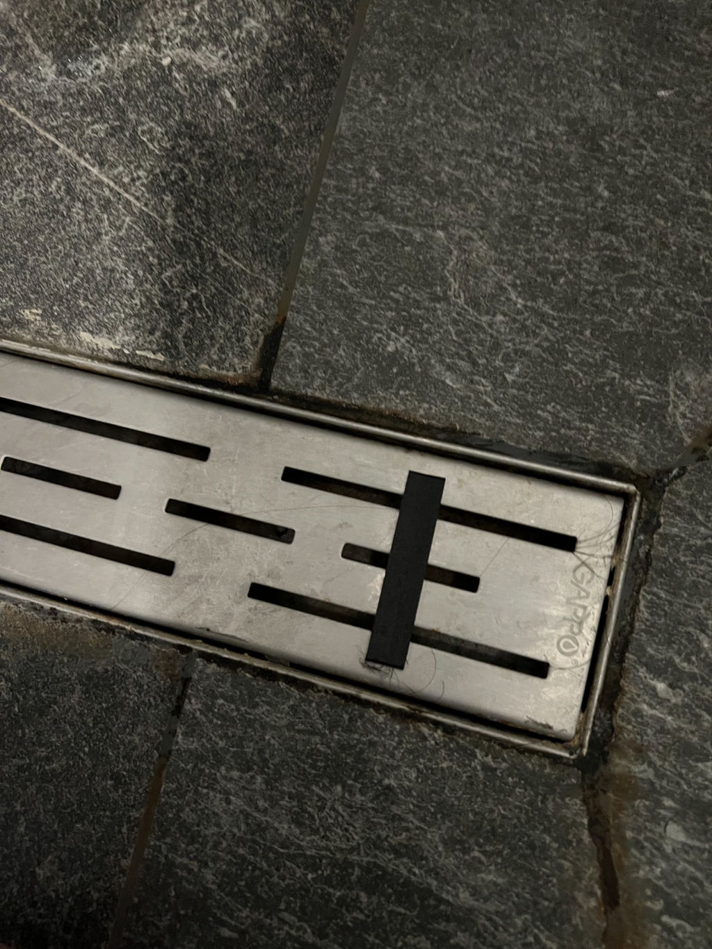 Shower drain handle